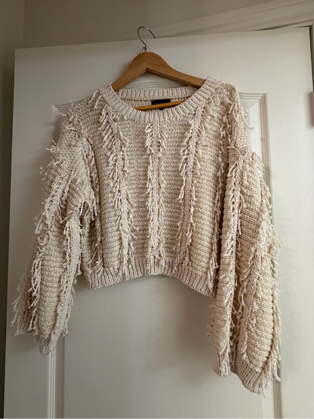 MAJORELLE Cream Fringe Crop Sweater. FROM REVOLVE